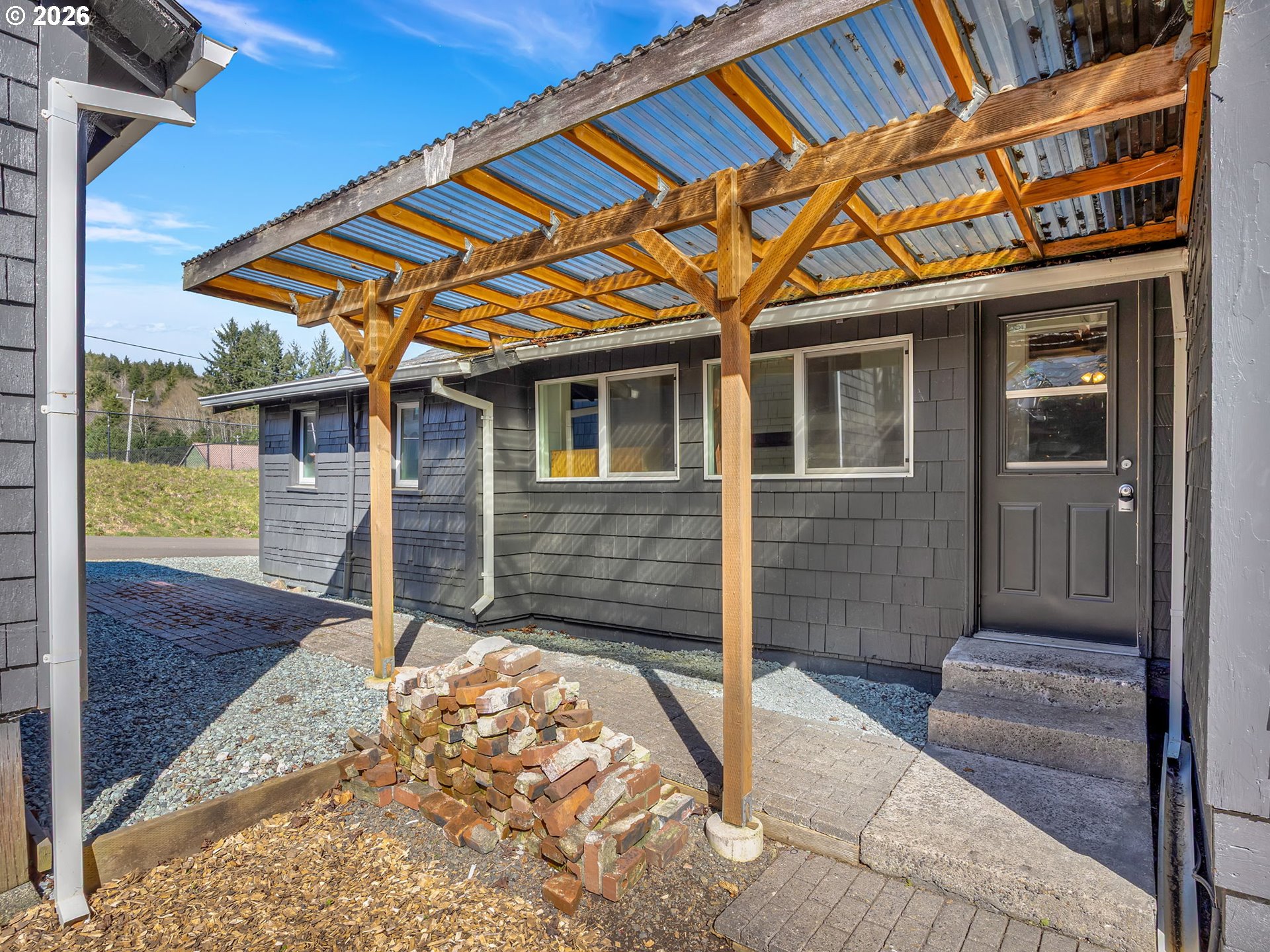36290 7th Street Nehalem, OR 97131 - Photo 30 of 38 a front view of a house