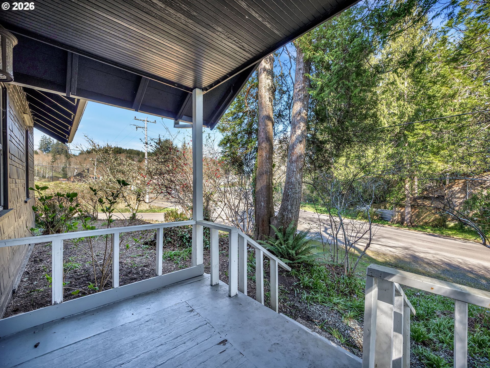 36290 7th Street Nehalem, OR 97131 - Photo 32 of 38 a view of a balcony with wooden floor