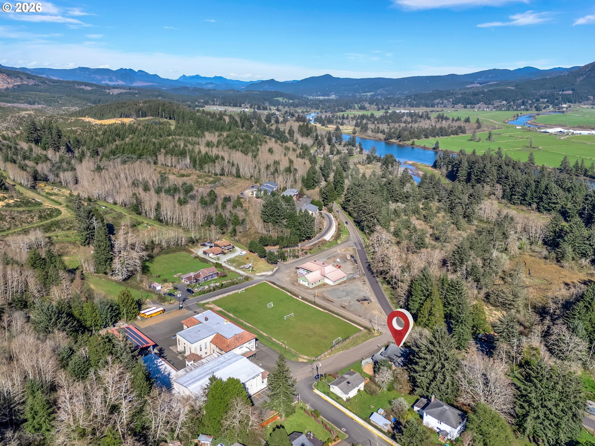 36290 7th Street Nehalem, OR 97131 - Photo 37 of 38 an aerial view of a residential houses with outdoor space