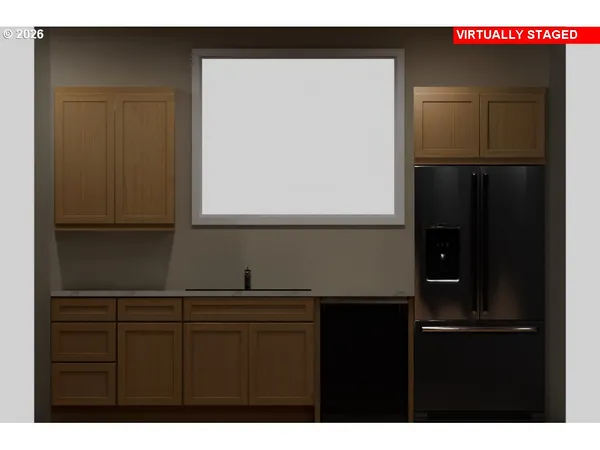 a kitchen with a sink and a mirror