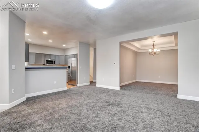 a view of a kitchen with a sink