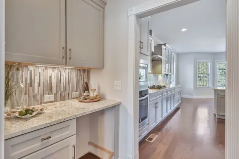 a bed room with furniture and a window