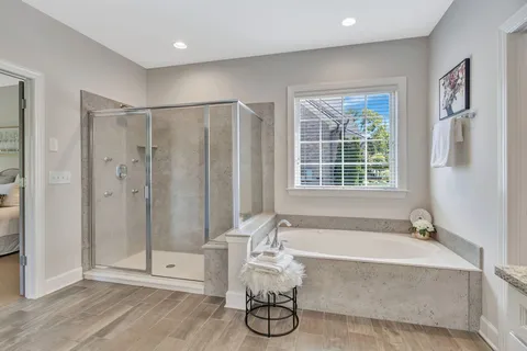 a bathroom with a bathtub and a sink
