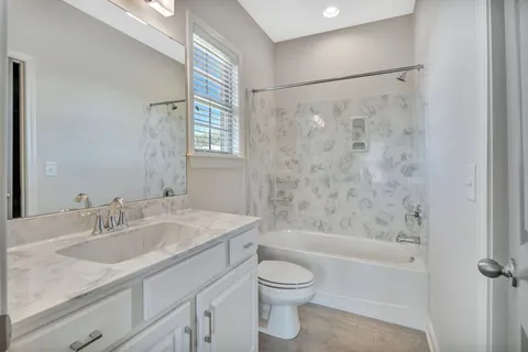 a view of a house with a yard and plants