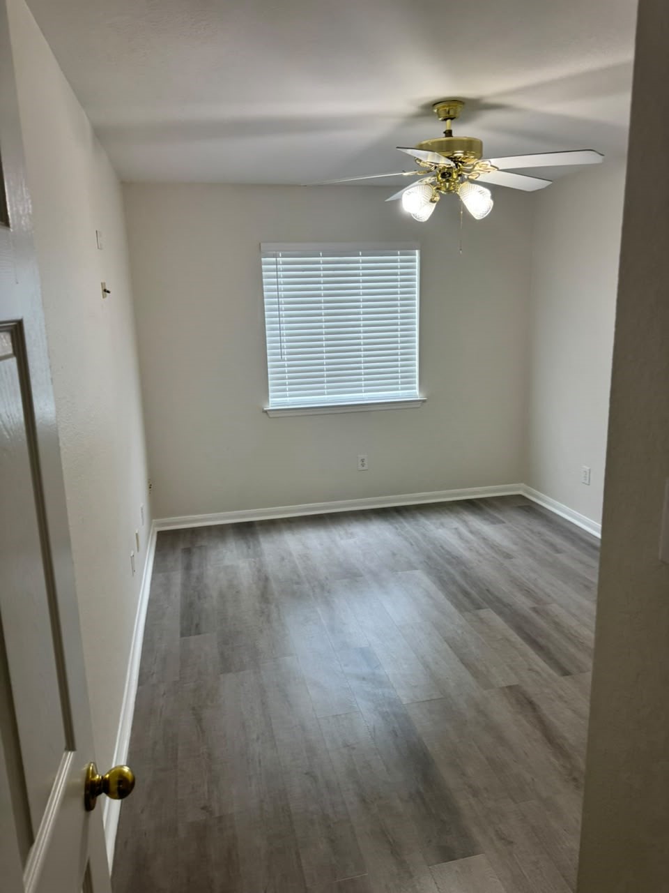 2110 Ridge Wood Lane Sugar Land, TX 77479 - Photo 18 of 23 a view of room with window and hardwood floor