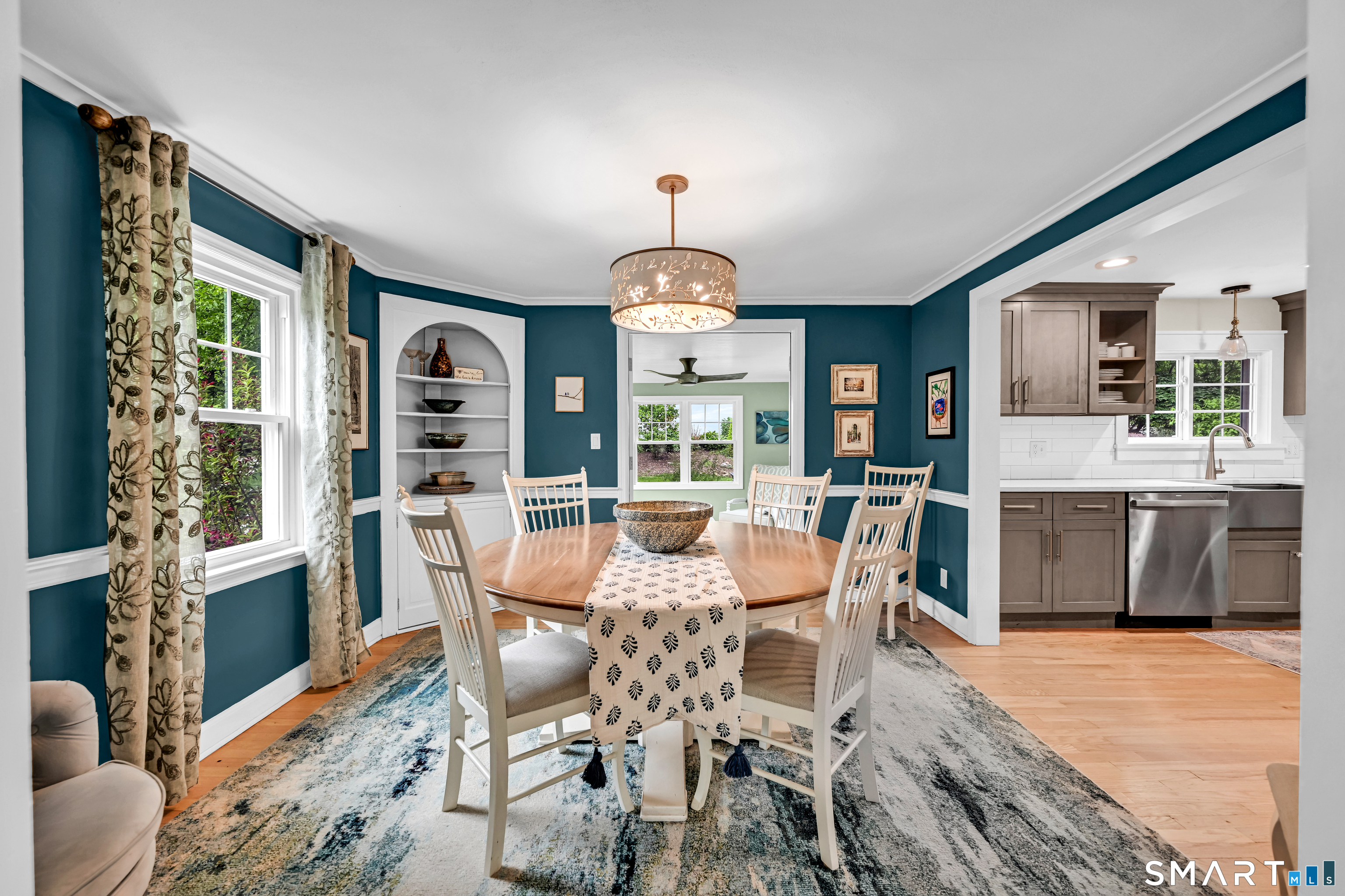 47 Spring Lane West Hartford, CT 06107 - Photo 12 of 38 a view of a dining room with furniture window and wooden floor