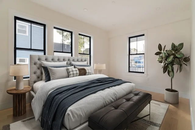 a view of a hallway with a living room