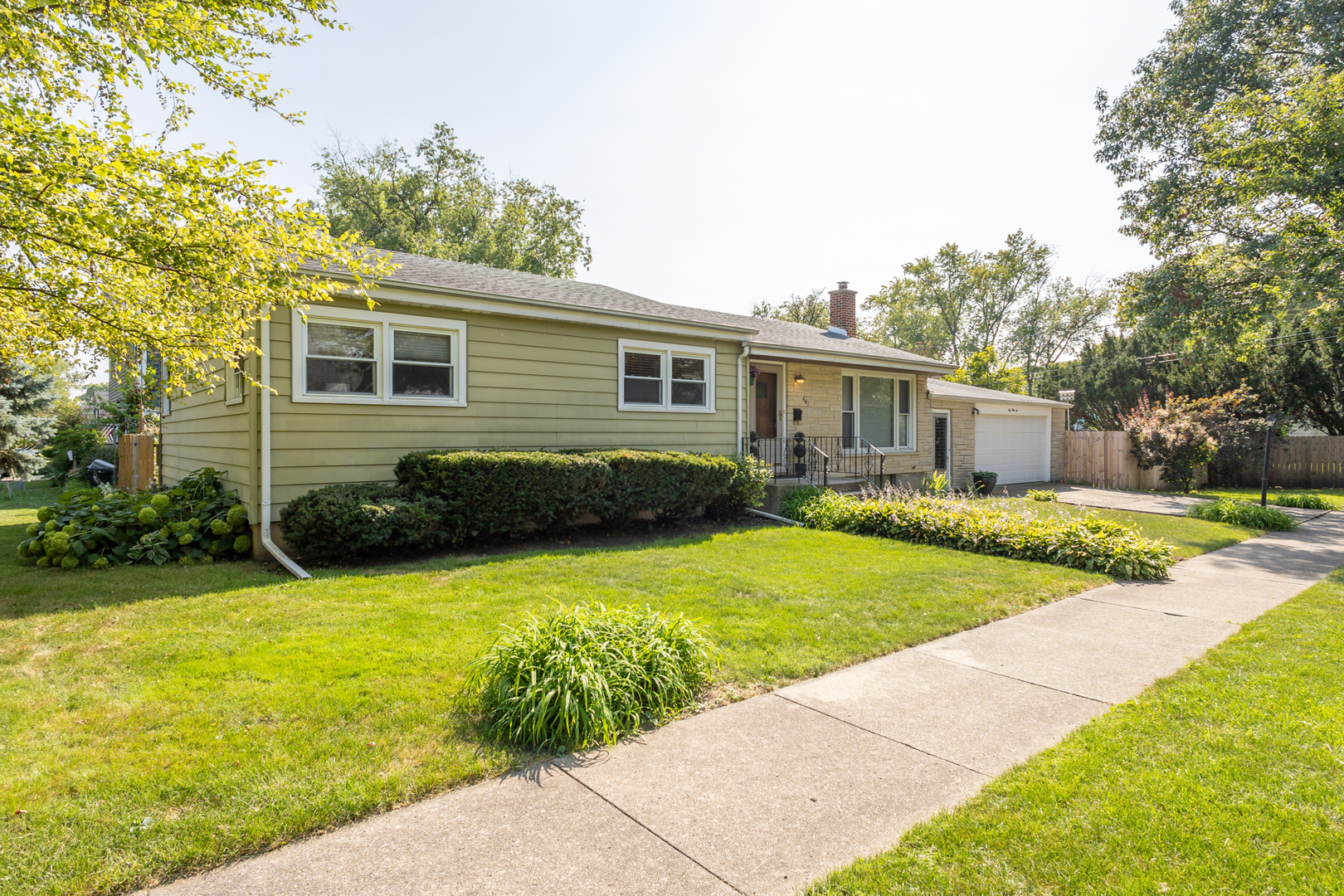 441 East Harrison Road Lombard, IL 60148 - Photo 1 of 1 a view of a house with swimming pool and a yard
