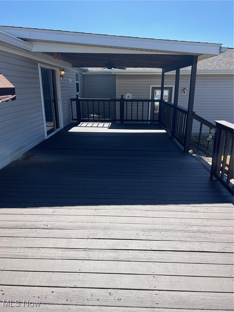 7716 Depot Road, Unit 7 Lisbon, OH 44432 - Photo 5 of 21 View of partially covered deck off back