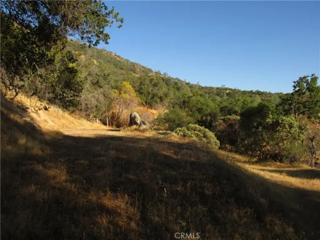 a view of a lake with mountains in the background