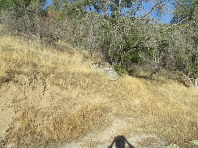 a view of a top of a house with a mountain