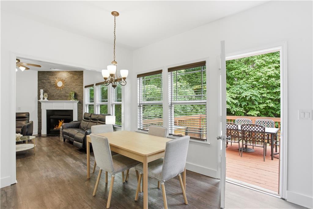 73 Allen Bridge Road Talmo, GA 30575 - Photo 14 of 33 a view of a dining room with furniture window and wooden floor
