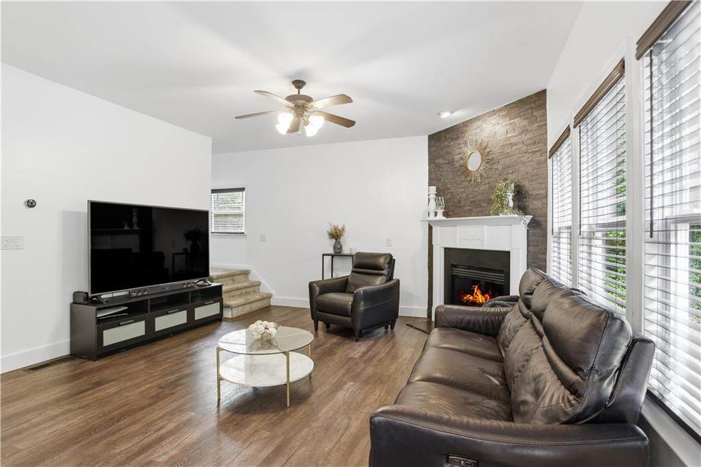 73 Allen Bridge Road Talmo, GA 30575 - Photo 18 of 33 a living room with furniture and a flat screen tv
