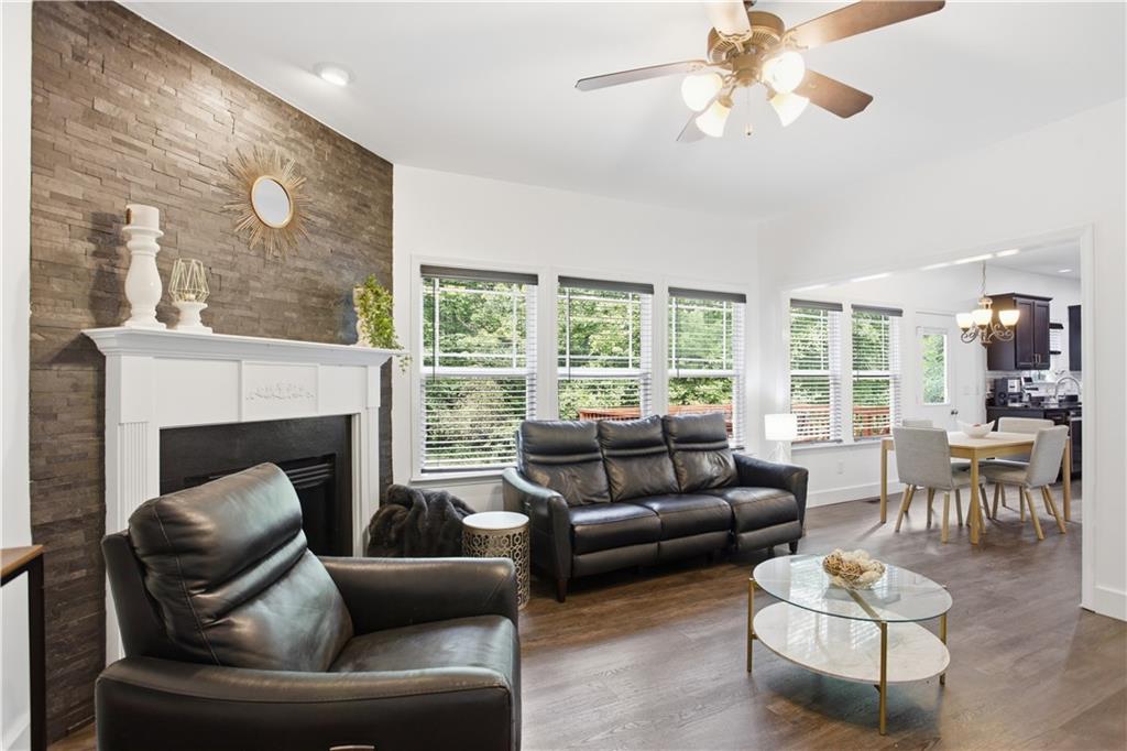 73 Allen Bridge Road Talmo, GA 30575 - Photo 19 of 33 a living room with furniture and a large window