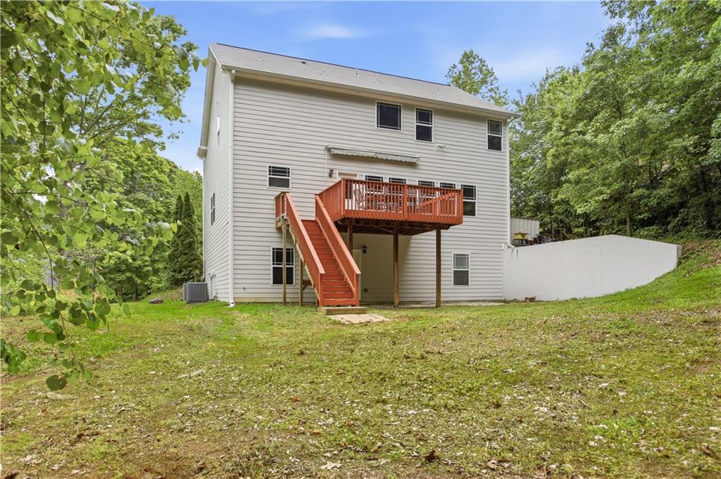73 Allen Bridge Road Talmo, GA 30575 - Photo 2 of 33 a view of a house with backyard and a tree