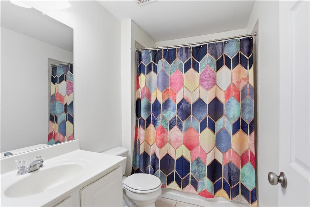73 Allen Bridge Road Talmo, GA 30575 - Photo 28 of 33 a bathroom with a sink and a toilet