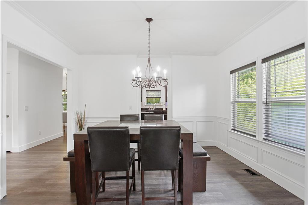 73 Allen Bridge Road Talmo, GA 30575 - Photo 6 of 33 a view of a dining room with furniture window and wooden floor