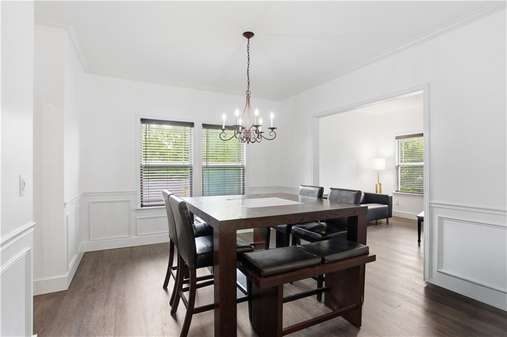 73 Allen Bridge Road Talmo, GA 30575 - Photo 7 of 33 a view of a dining room with furniture window and wooden floor