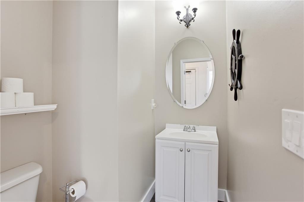 73 Allen Bridge Road Talmo, GA 30575 - Photo 8 of 33 a bathroom with a toilet a sink and mirror