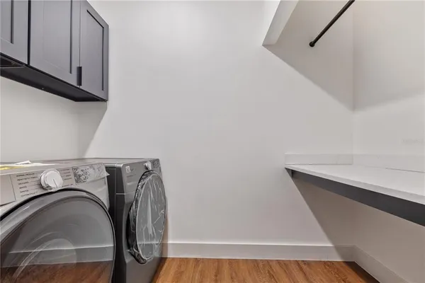 a bathroom with a sink a toilet and bathtub