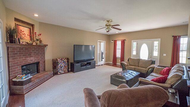 1249 Meeks Cemetery Road Burns, TN 37029 - Photo 7 of 20 Spacious living room with beautiful, brick fireplace!