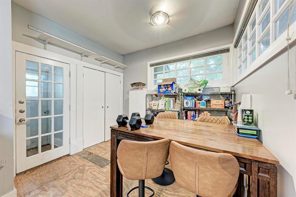 2834 Salado Street Austin, TX 78705 - Photo 11 of 40 a view of a dining room with furniture window and outside view