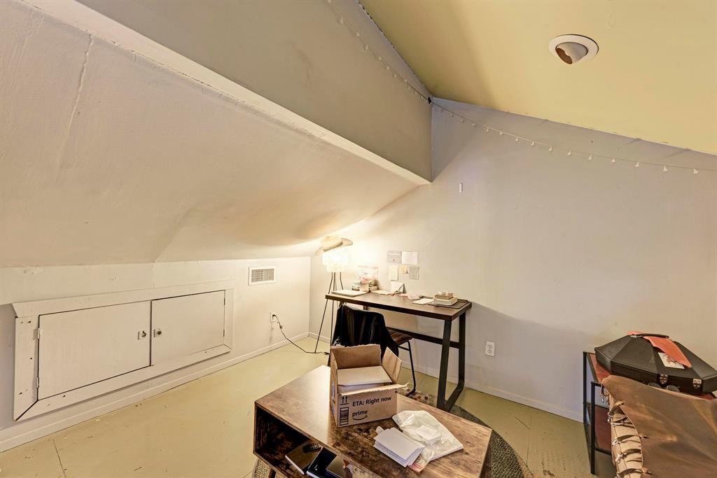2834 Salado Street Austin, TX 78705 - Photo 17 of 40 a dining room with furniture and wooden floor