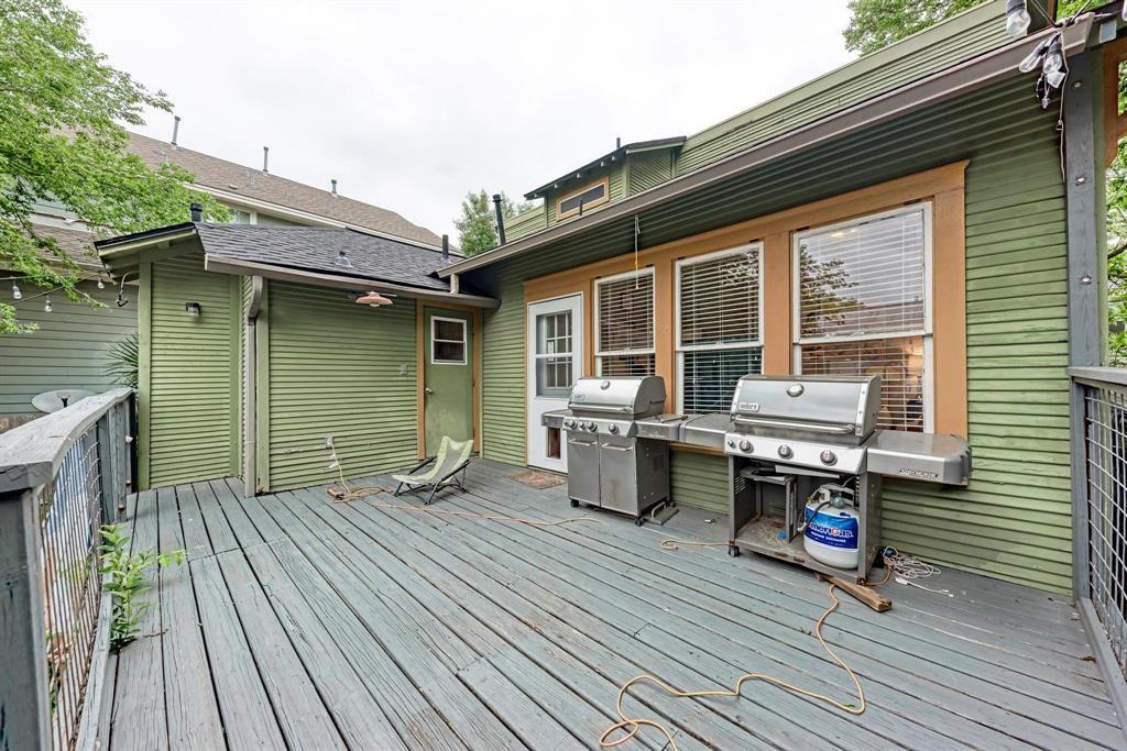 2834 Salado Street Austin, TX 78705 - Photo 20 of 40 a backyard of a house with seating space