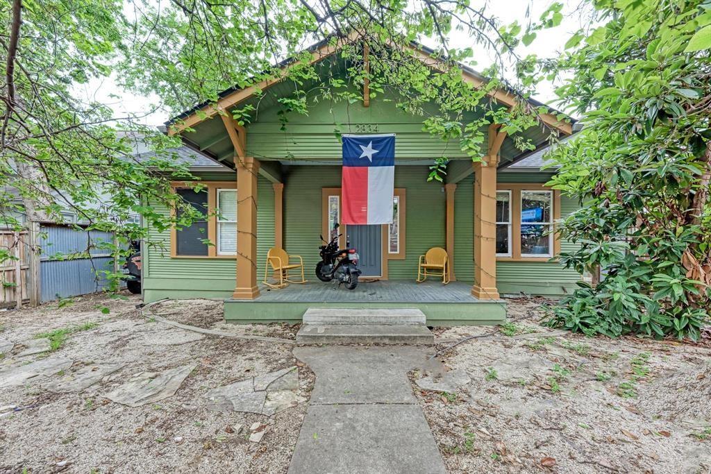 2834 Salado Street Austin, TX 78705 - Photo 2 of 40 a front view of a house with garden