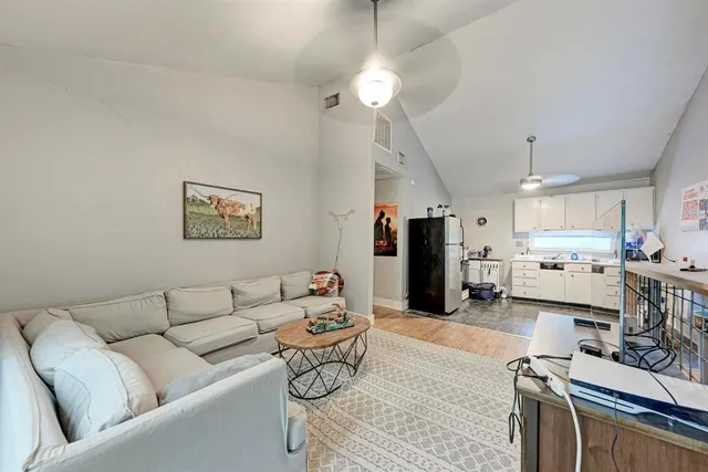 a view of a hallway with washer and dryer
