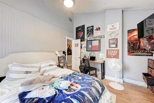 a view of a balcony with wooden floor