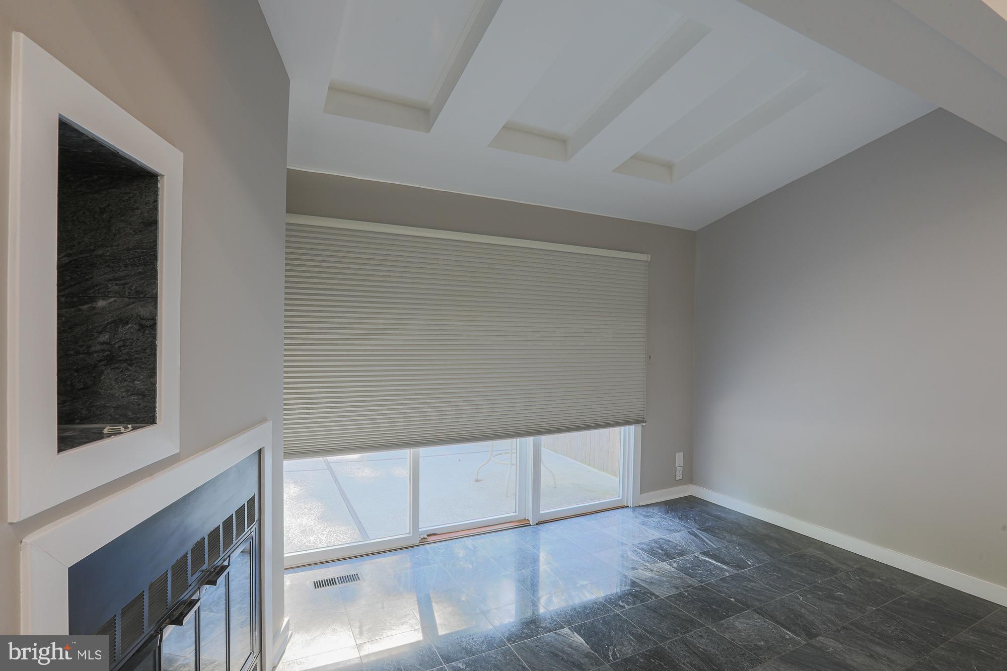 8315 Stevenson Road Baltimore, MD 21208 - Photo 21 of 62 Owner suite with fireplace and marble floor