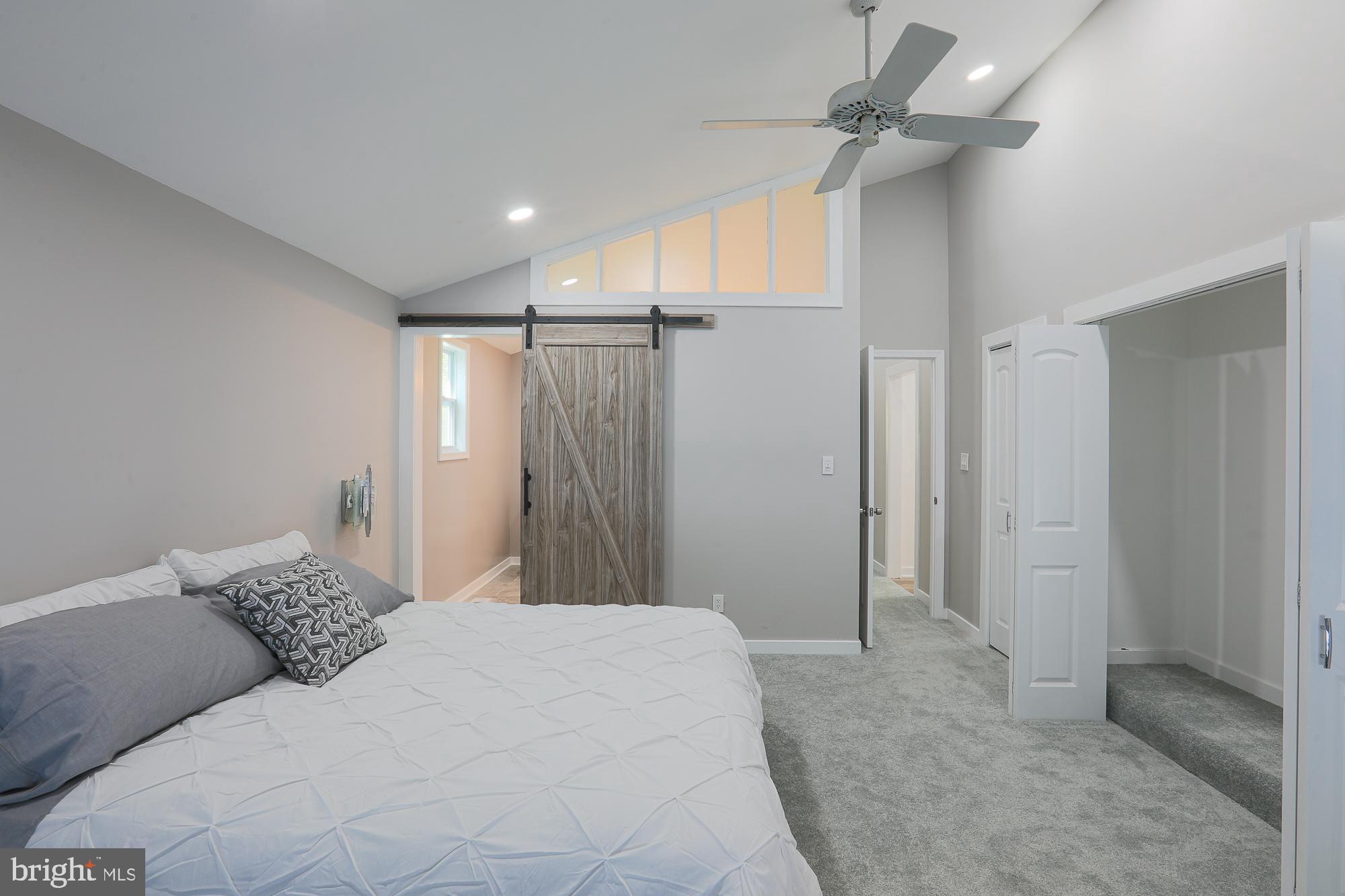 8315 Stevenson Road Baltimore, MD 21208 - Photo 26 of 62 The high ceiling allows light in the bathroom