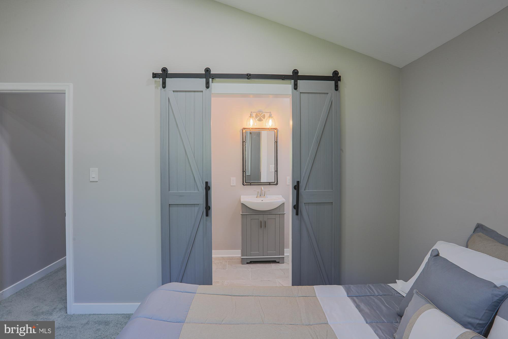 8315 Stevenson Road Baltimore, MD 21208 - Photo 35 of 62 Split barn door high ceiling