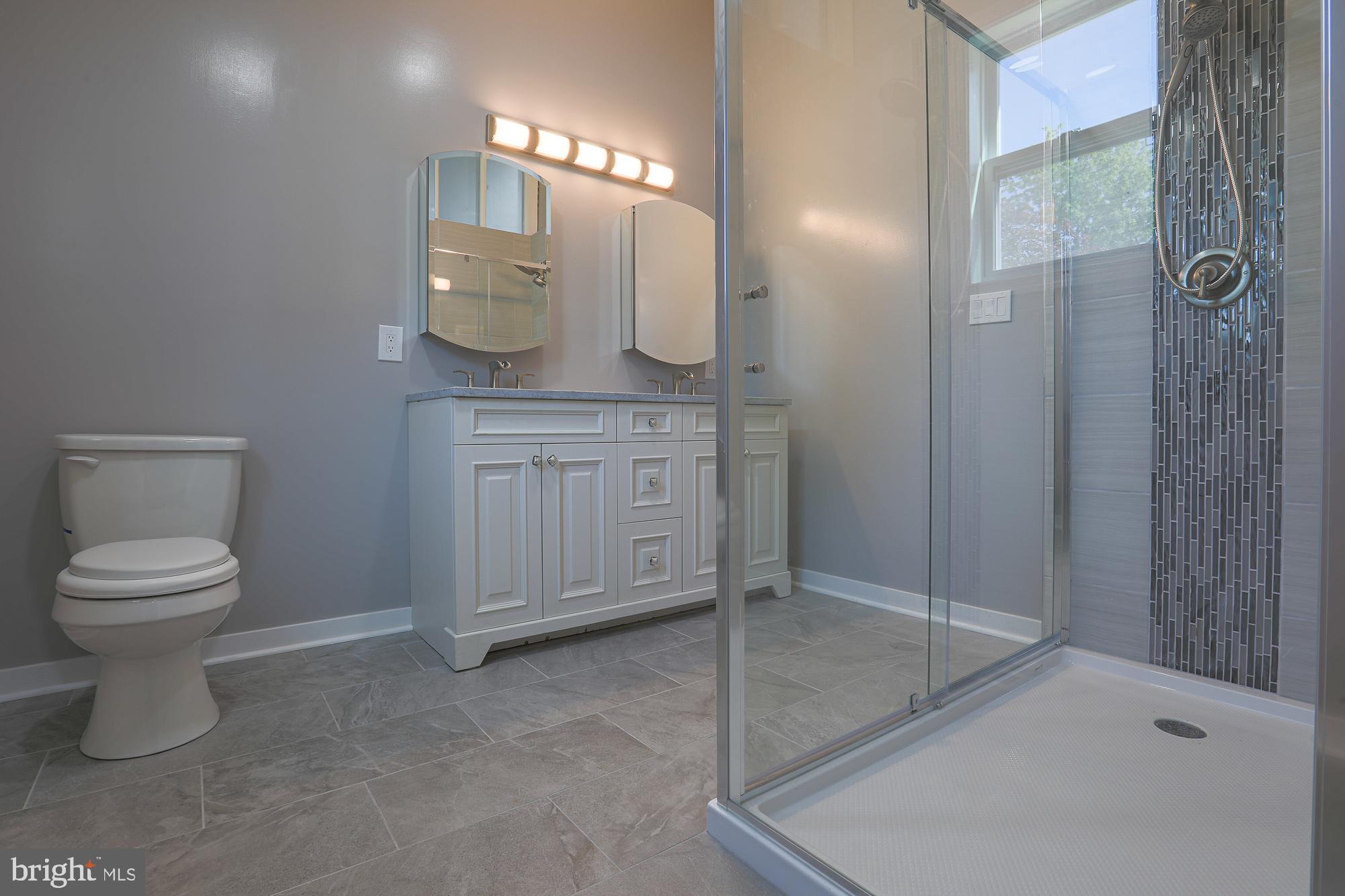 8315 Stevenson Road Baltimore, MD 21208 - Photo 38 of 62 Another walk-in shower