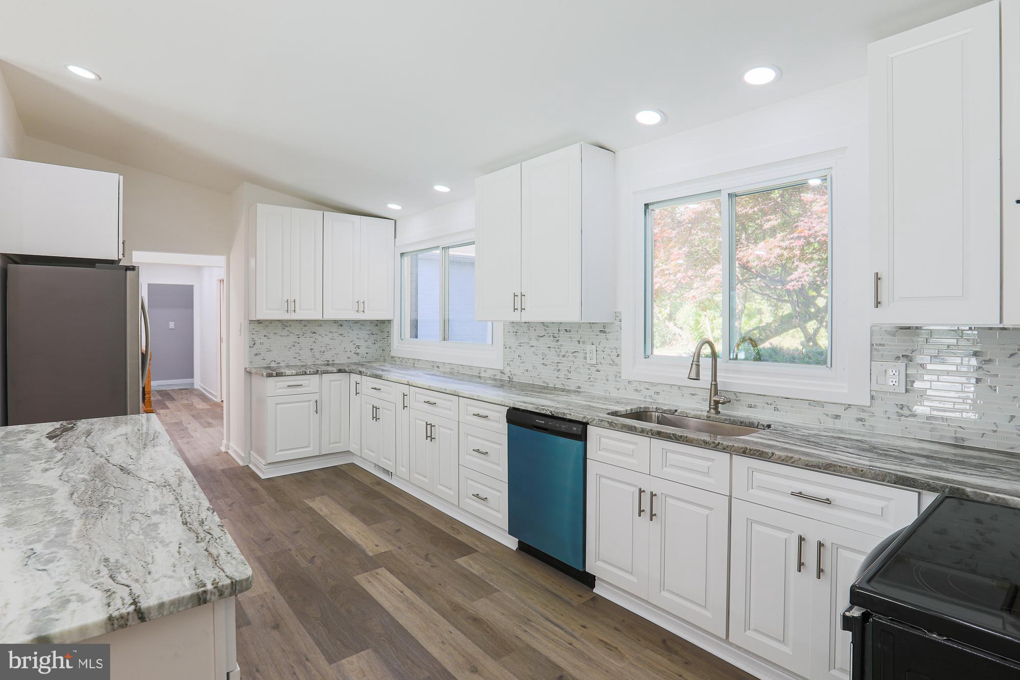 8315 Stevenson Road Baltimore, MD 21208 - Photo 5 of 62 Bright kitchen between the foyer and 2 car garage