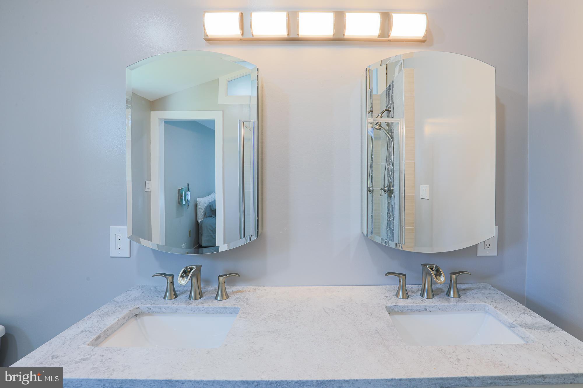 8315 Stevenson Road Baltimore, MD 21208 - Photo 40 of 62 Double sinks double mirrors
