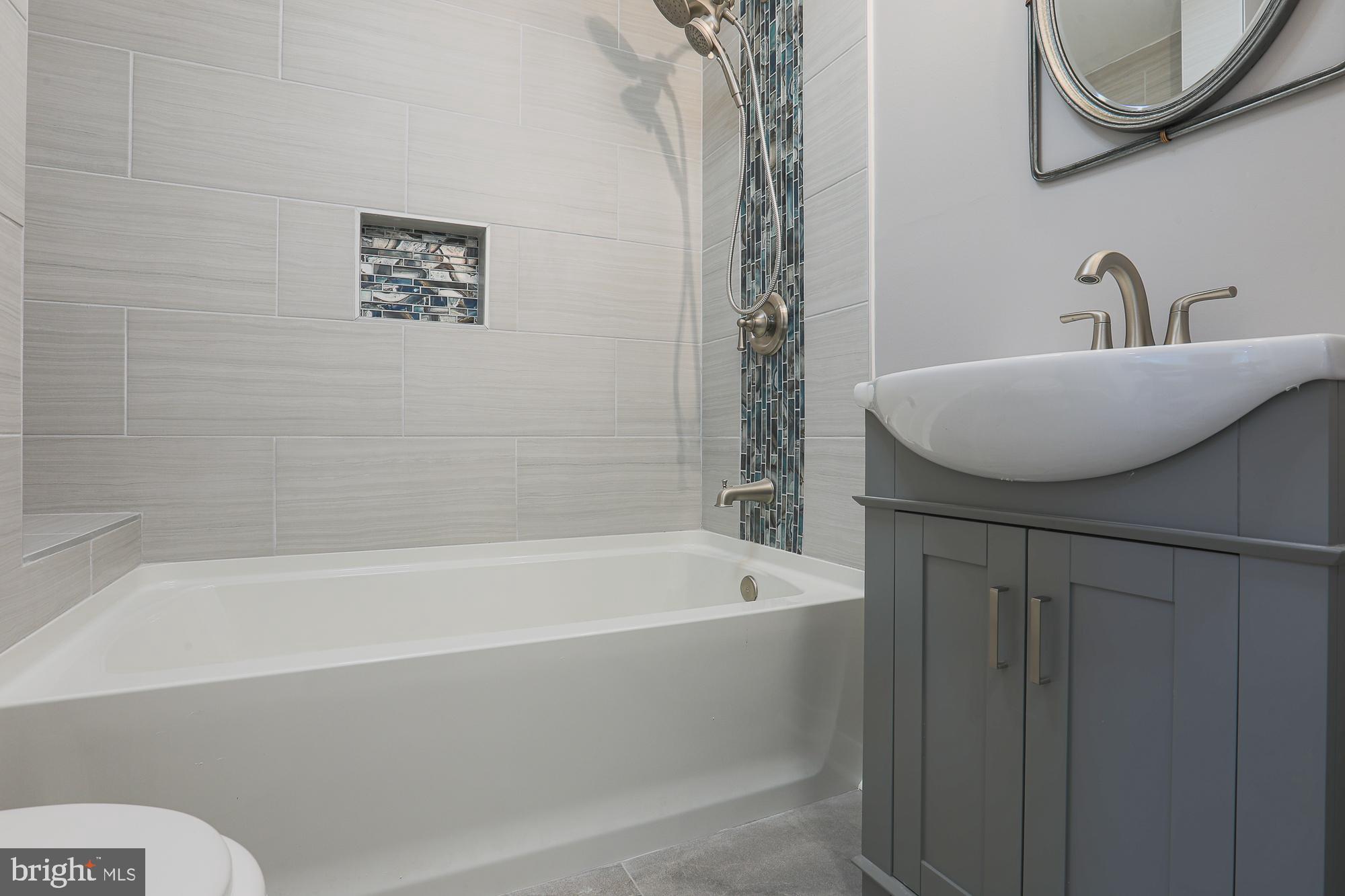 8315 Stevenson Road Baltimore, MD 21208 - Photo 41 of 62 First-floor bath with tub