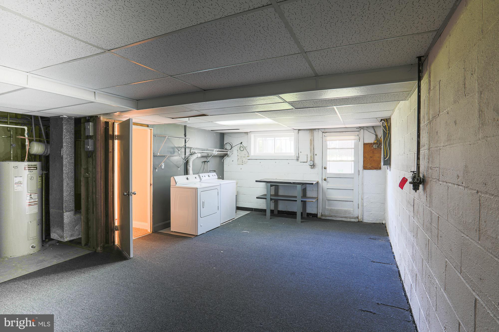 8315 Stevenson Road Baltimore, MD 21208 - Photo 47 of 62 Laundry with door to outside
