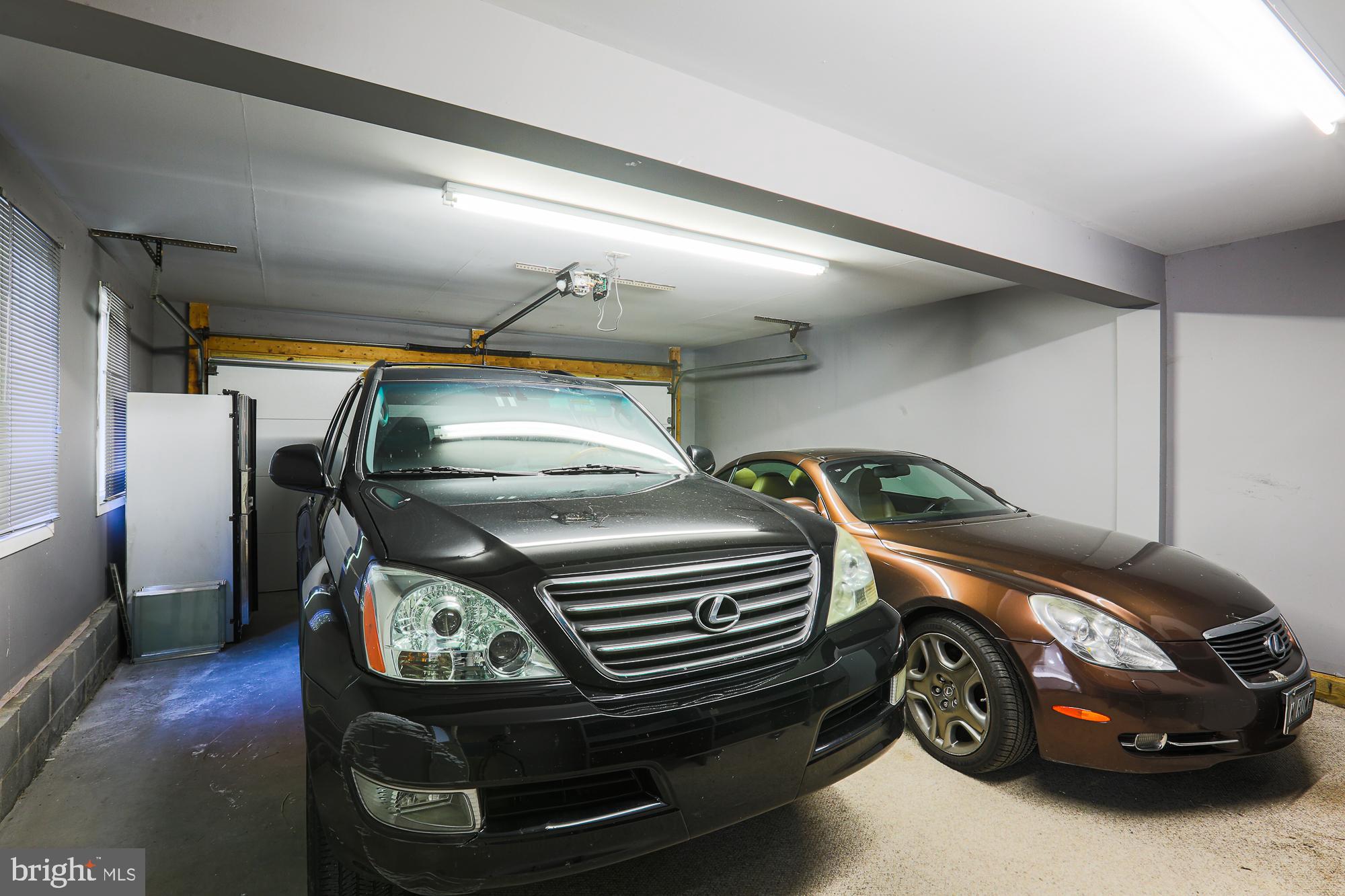8315 Stevenson Road Baltimore, MD 21208 - Photo 51 of 62 2 car garage large enough for the SUV