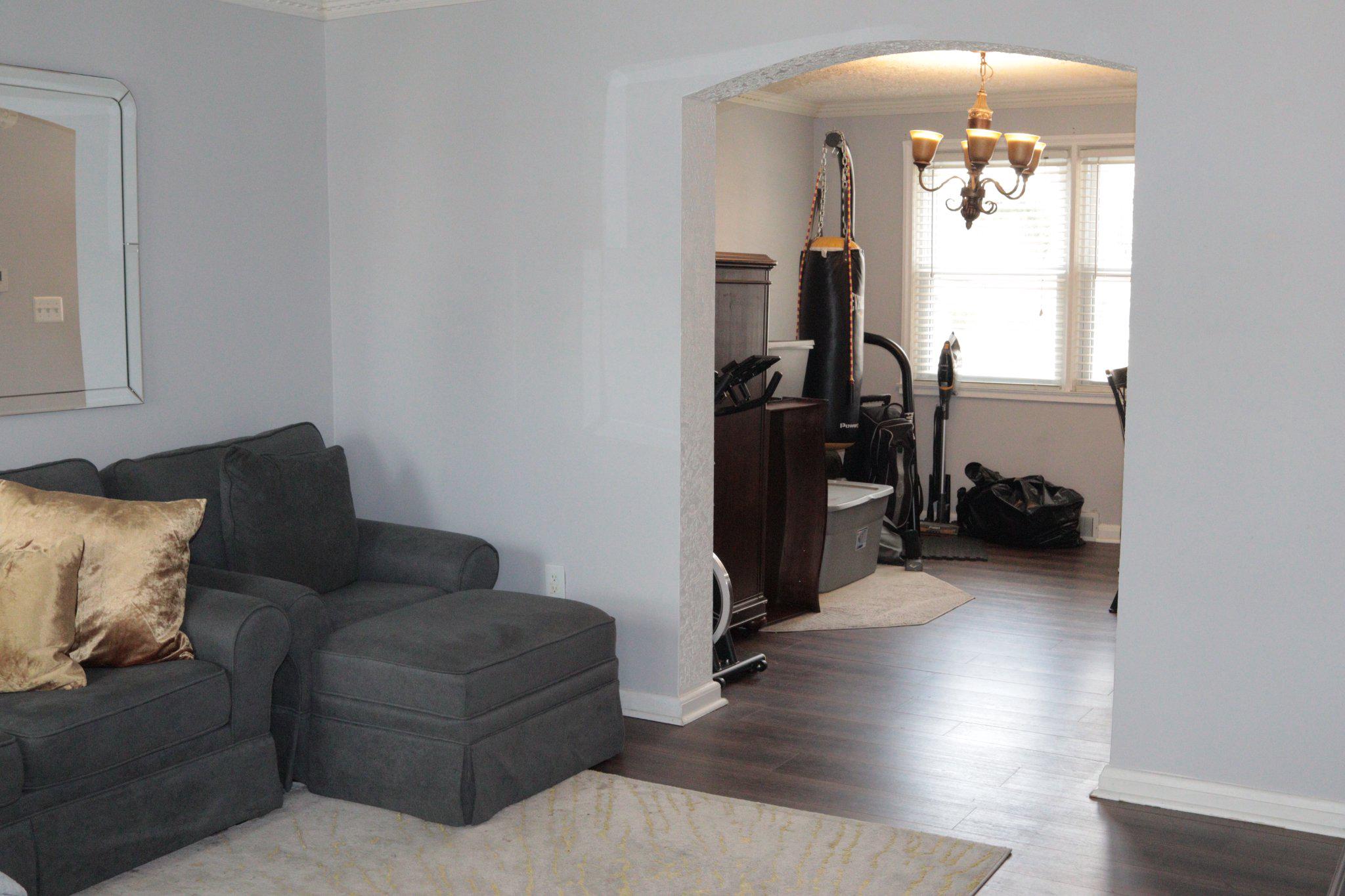 1328 Cedarcroft Road Baltimore, MD 21239 - Photo 3 of 39 Elegant arched entry between living spaces.