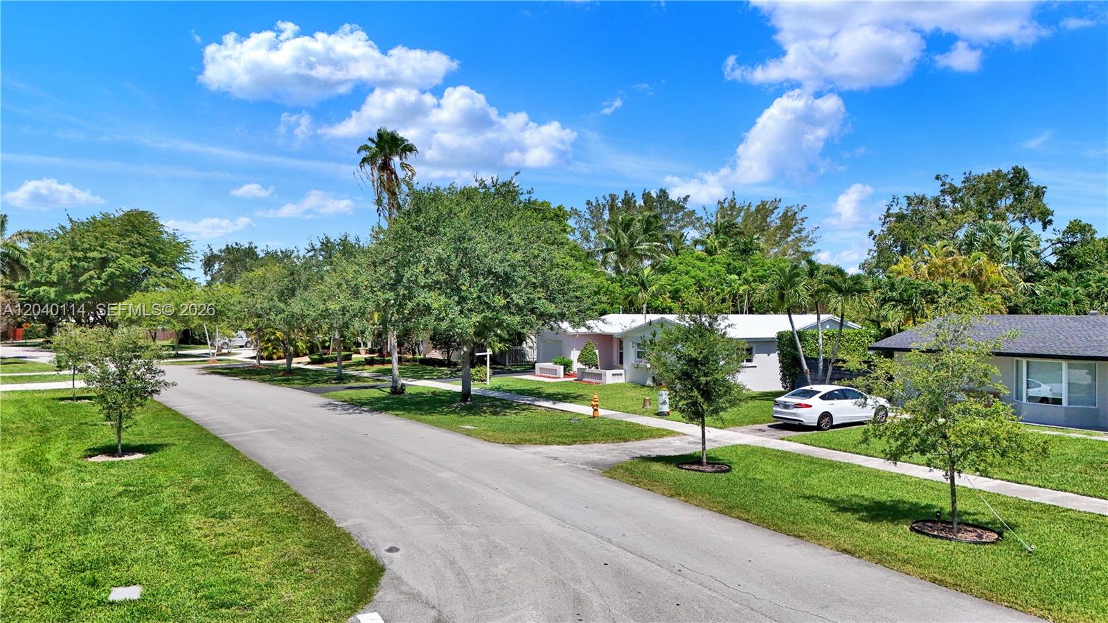 10435 Southwest 96th Street Miami, FL 33176 - Photo 42 of 44 House sits back off the street with a sidewalk in the front