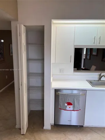a utility room with washer and dryer