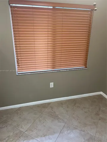 a view of a room with a window