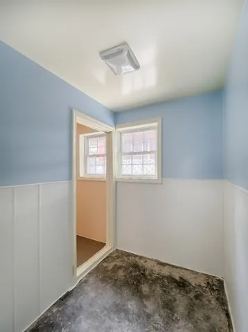 an empty room with windows