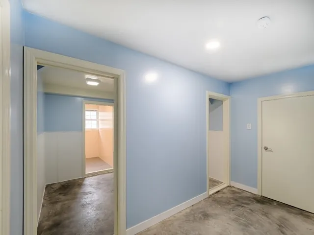 an empty room with windows