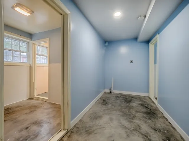 an empty room with windows