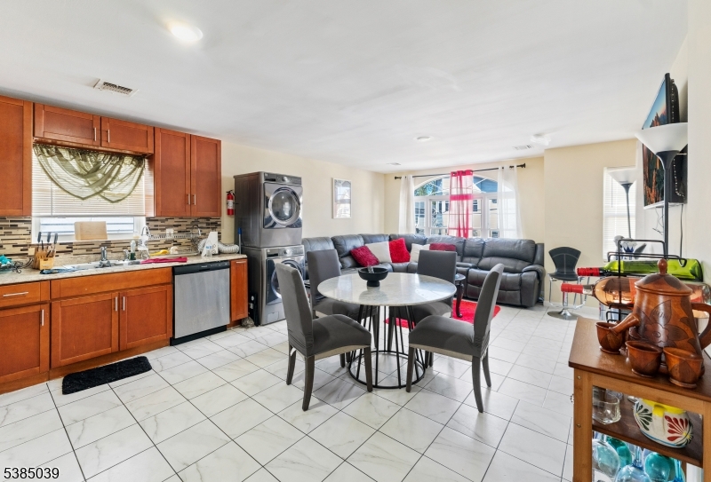 22 Godwin Avenue Paterson, NJ 07501 - Photo 2 of 16 a view of a dining room with furniture