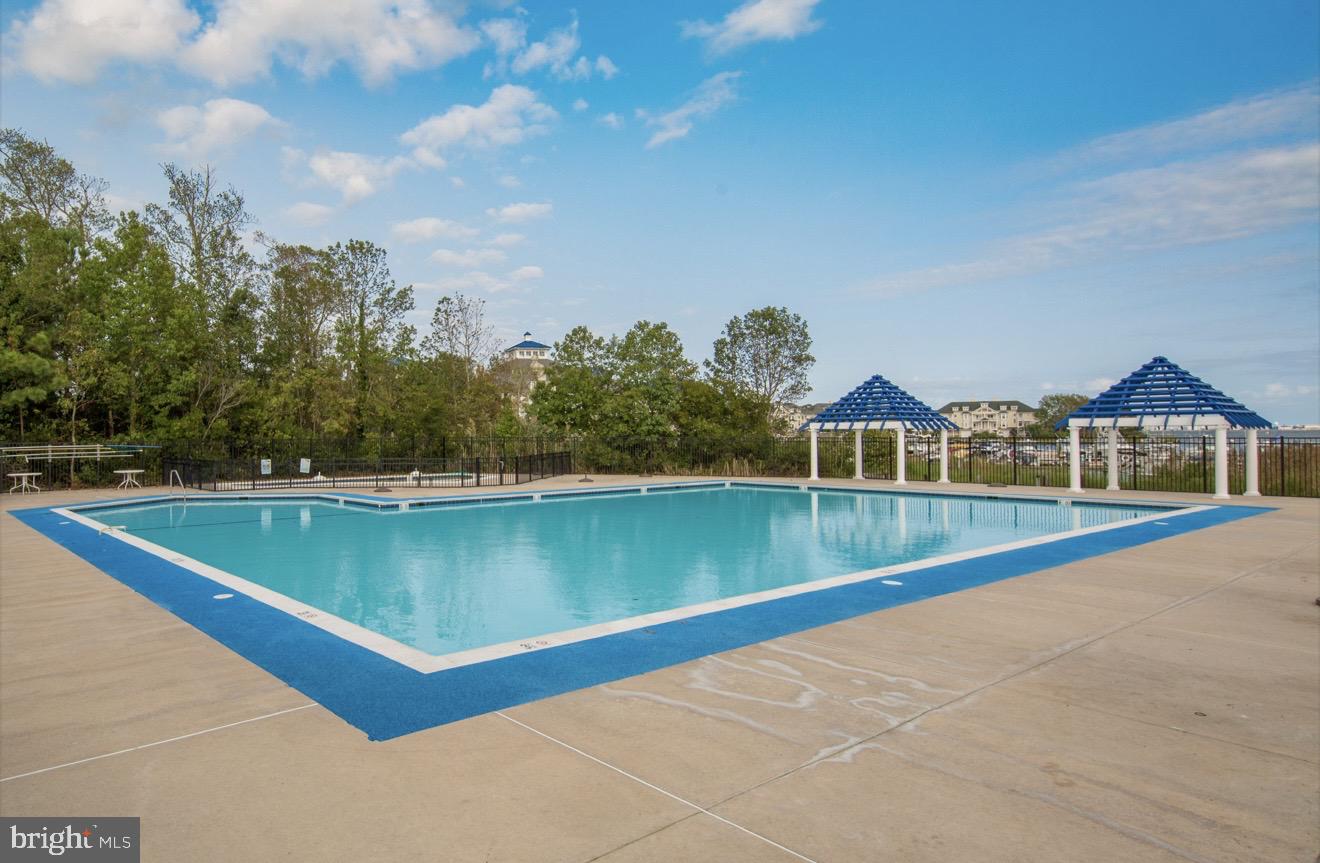 5 Falcon Bridge Road Ocean Pines, MD 21811 - Photo 56 of 59 a view of an outdoor space and swimming pool