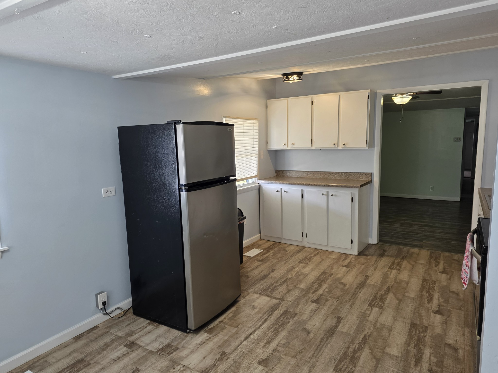 65 Anthony Mill Road Tullahoma, TN 37388 - Photo 25 of 43 a kitchen with granite countertop a refrigerator and a sink
